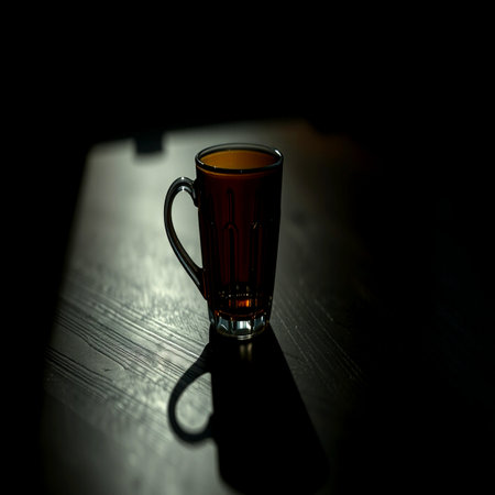 A glass of hot tea on a dark background. Selective focus.の写真素材