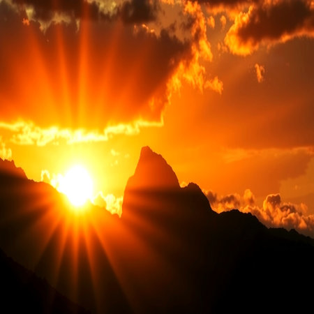 Mountain range at sunset with sunbeams. Nature composition.の写真素材