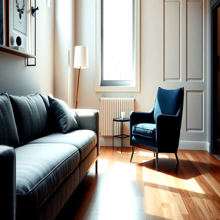 interior of a modern living room with a sofa and armchairの写真素材