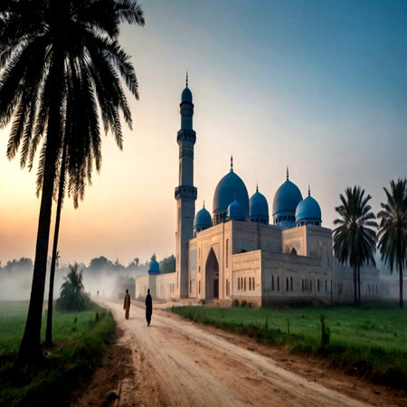 Silhouette of a man walking in front of the mosque at sunrise