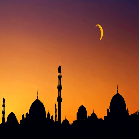 Silhouette of mosque and crescent moon at sunset background.