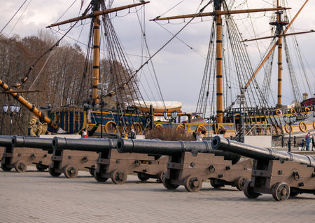 City square with cannons and a ship