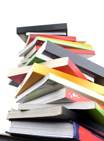 some of books pile isolated on white backgroundの写真素材
