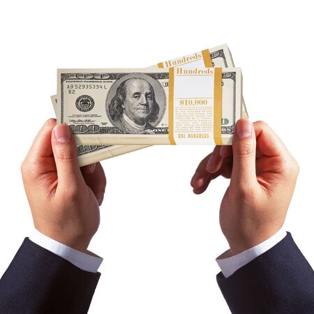 business hand holding dollars money  Isolated on white backgroundの写真素材