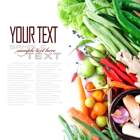 Tomatos, chives, garlic, red chili, ginger and lettuce on white background (with sample text)の写真素材
