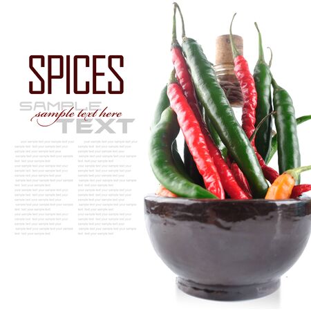 red hot chili peppers isolated on white background with sample textの写真素材