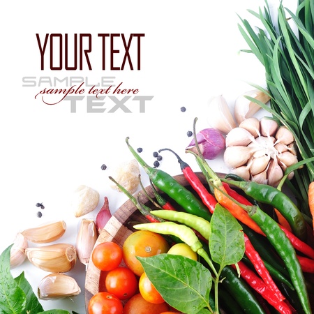 Tomatos, chives, garlic, red chili, ginger and onion on white background (with sample text)の写真素材