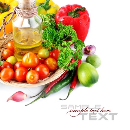 Tomatos, paprika, garlic, red chili, olive oil and parsley on white background (with sample text)の写真素材