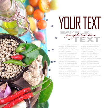 Tomatos, chives, garlic, red chili, ginger and pepper on white background  with sample text の写真素材