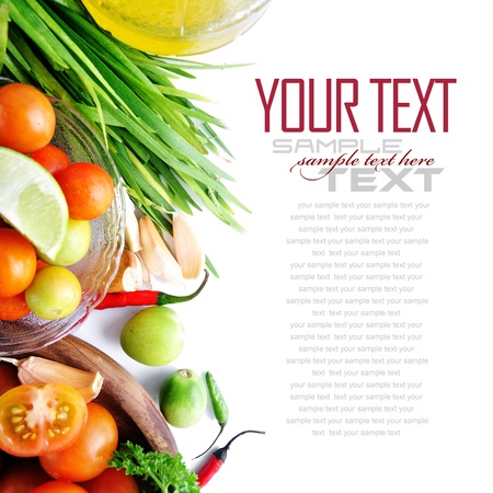 Tomatos, chives, garlic, red chili, lime and olive oil on white background  with sample text の写真素材