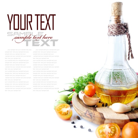 Tomatos, chives, garlic, red chili, lime and olive oil on white background  with sample text の写真素材