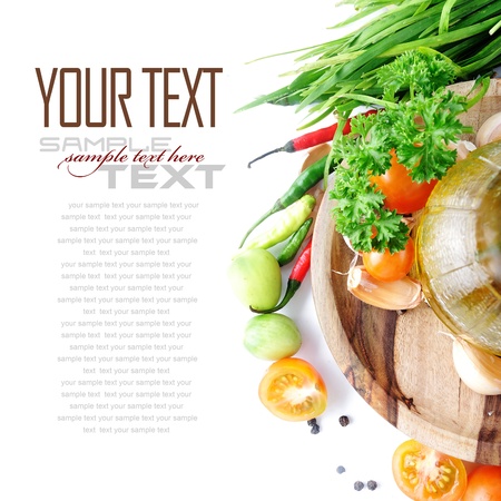 Tomatos, chives, garlic, red chili, lime and parsley on white background  with sample text の写真素材