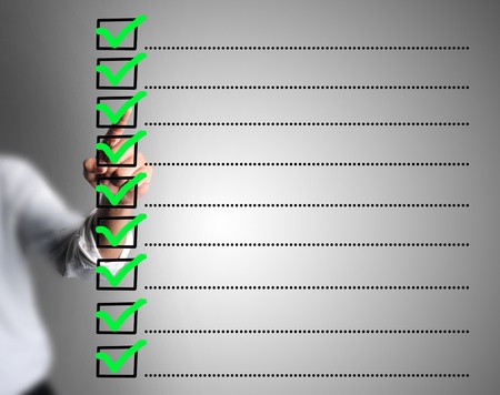 Business man designed on a checklist box  With green checklist の写真素材