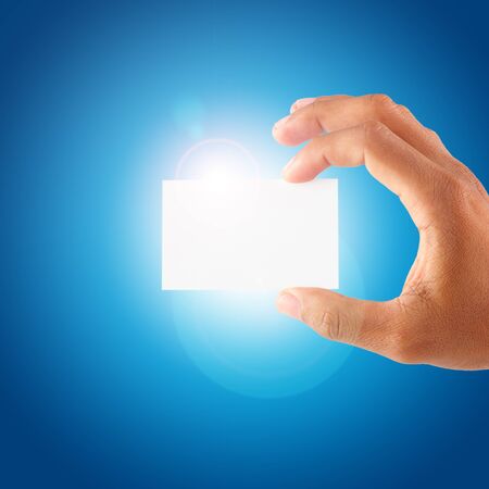 hand holding a blank cardの写真素材