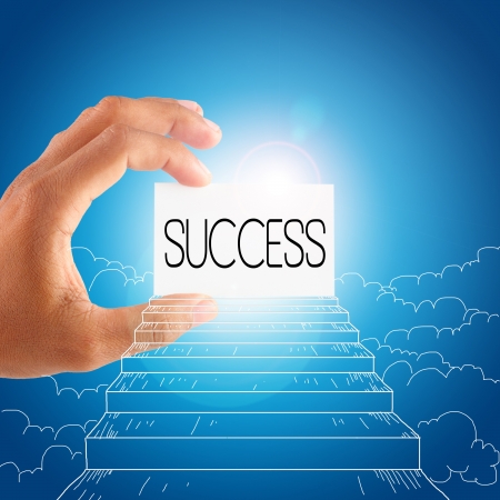 success symbol in the blue sky backgroundの写真素材
