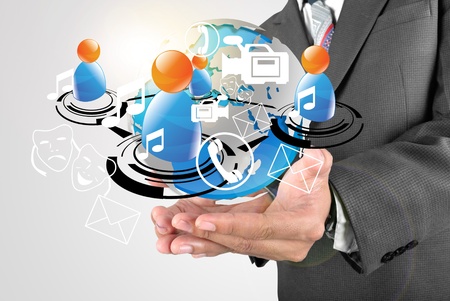 Business man holding social media in the worldの写真素材