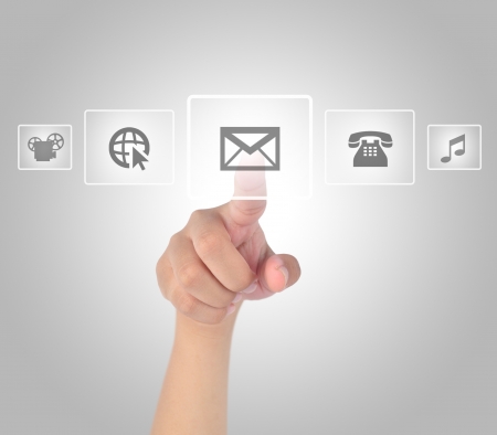 Hand touching media in modern touch screen の写真素材