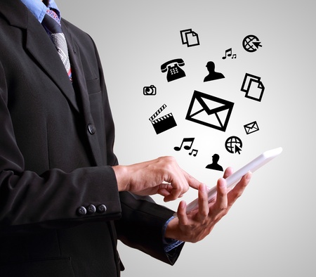 Business hand playing modern digital tablet computer の写真素材