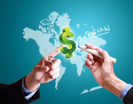 hands pushing finance structure worldwideの写真素材