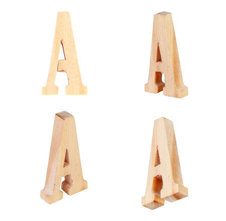 English alphabet  A - collage of 4 isolated vintage woodの写真素材
