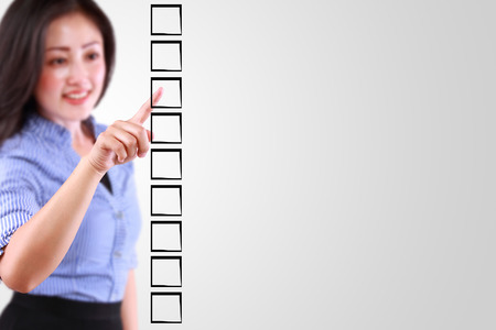 business woman designed on a checklist boxの写真素材