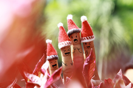 Christmas background with human finger conceptの写真素材