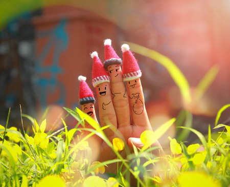 Christmas background with human finger conceptの写真素材