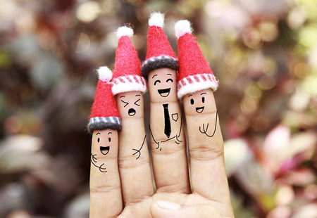 Christmas background with human finger conceptの写真素材