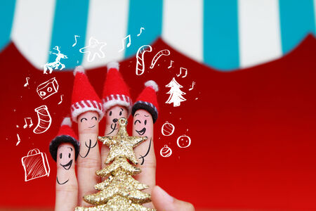 Christmas background with human finger conceptの写真素材