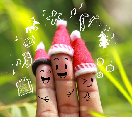 Christmas background with human finger conceptの写真素材