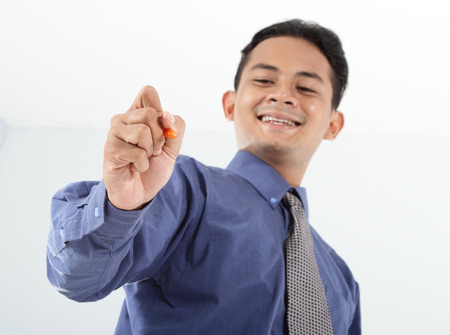 business man with hand gesture show a typingの写真素材