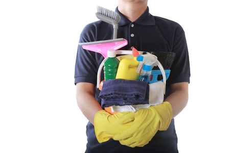 attractive man standing with cleaning serviceの写真素材