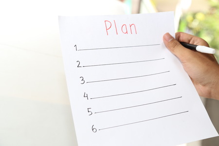 hand holding business planの写真素材