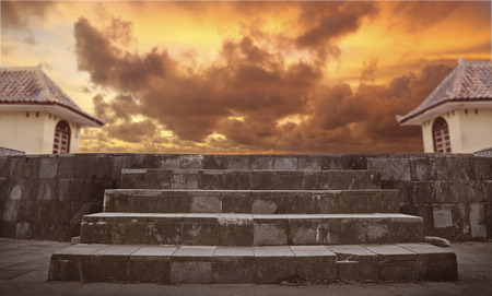 empty outdoor with sunset sky, rock stage and wooden floor