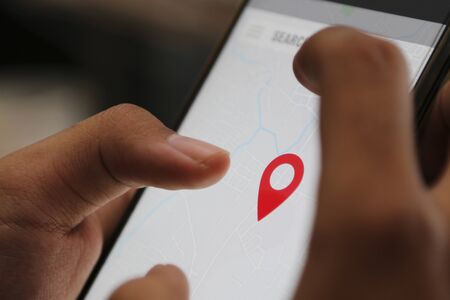 sharing smart location on a smart phoneの写真素材