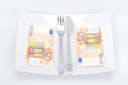 Decoration with euro paper banknotes on plateの写真素材