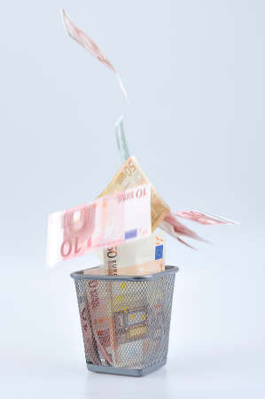 Decoration with euro paper banknotes  in Refuse binの写真素材