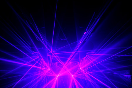 Colorful laser and stage lights isolated on black, laser show.の写真素材