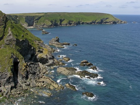Stone coast near Gwithian, Hells Mouth on the North Cornish Coast near Godrey, Cornwall, United...
