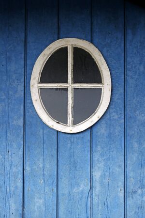 Door detail with round window, Lower Saxony, Germany, Europeの写真素材