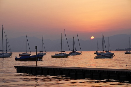 At the promenade of Bardolino, Lake Garda in Italy in the evening, Europeの写真素材