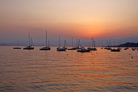At the promenade of Bardolino, Lake Garda in Italy in the evening, Europeの写真素材