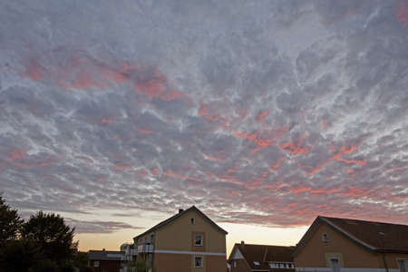 Evening sky with dark and red clouds in Lower Saxony, Germany, Europeの写真素材