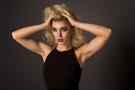 Cute blonde woman in gorgeous dressの写真素材