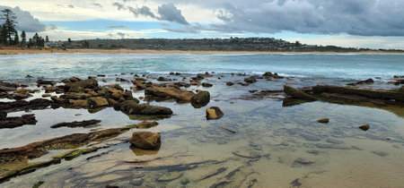 Natural seaside scene, view of the sea in a rocky seaside in Dee Why Beach, Sydney. Rocks in the...