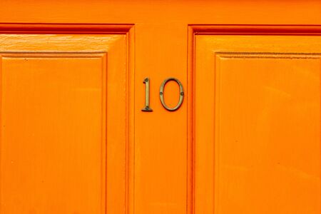 House number 10 - cheerful in orangeの写真素材
