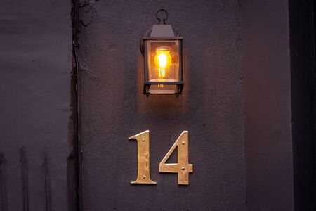 House number 14 lit from aboveの写真素材