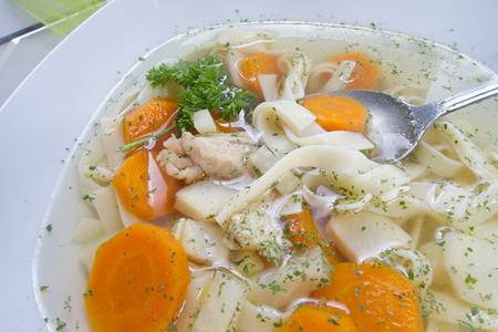 Hot fresh healthy chicken homemade soupの写真素材