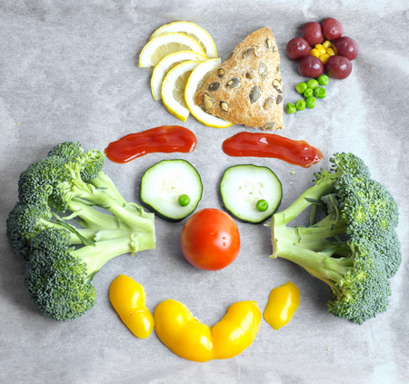 Colored food clown on plateの写真素材