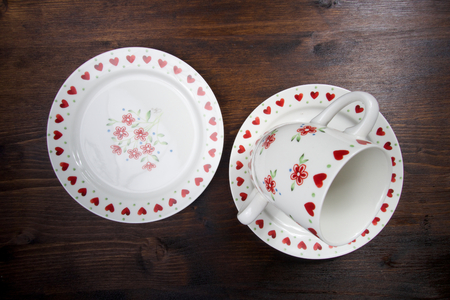 Empty pattern cups of tea with platesの写真素材